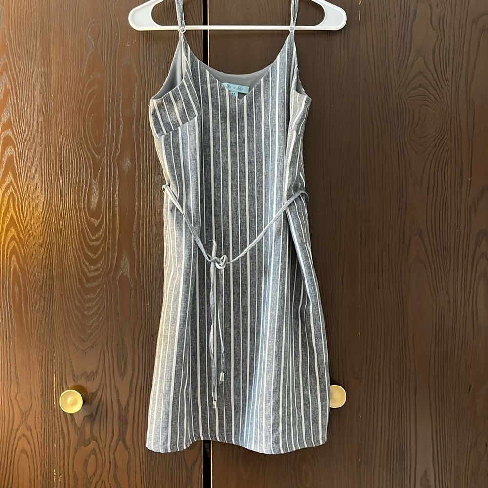 She & Sky spaghetti strapped navy/ white striped dress. Size Medium